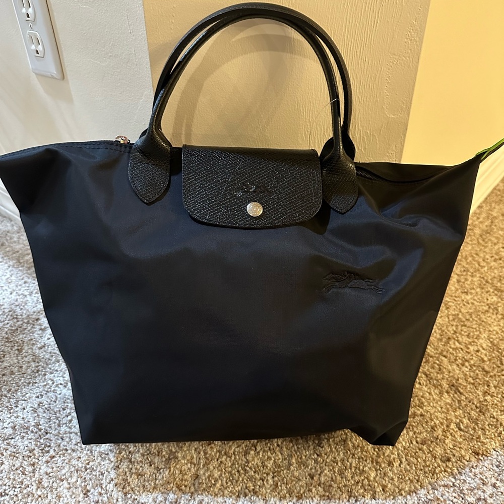 Medium size brand new longchamp tote